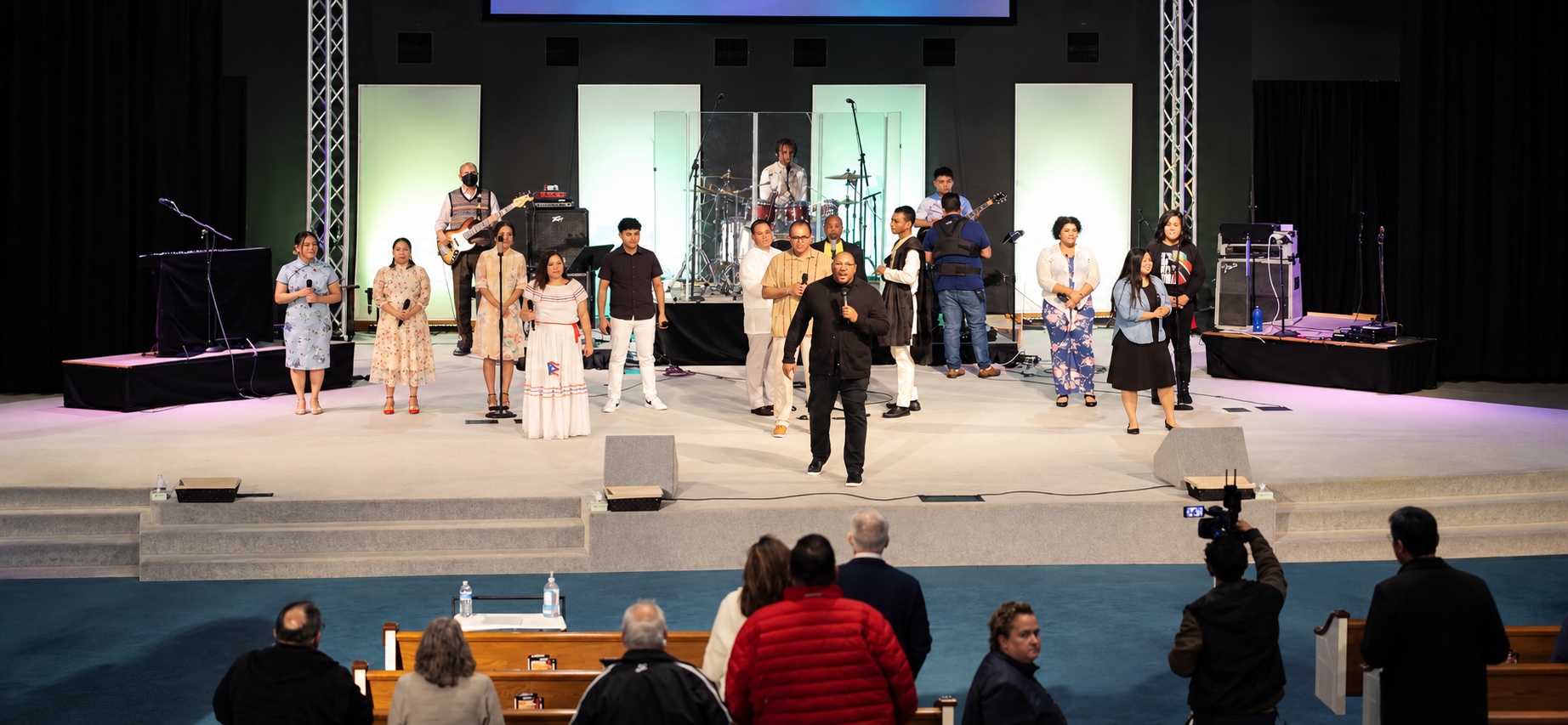Worship leaders and musicians on a church stage